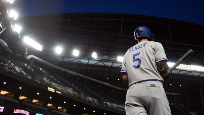 Sep 24, 2021; Phoenix, Arizona, USA; Los Angeles Dodgers shortstop Corey Seager (5) waits on deck against the Arizona Diamondbacks during the first inning at Chase Field. Mandatory Credit: Joe Camporeale-USA TODAY Sports